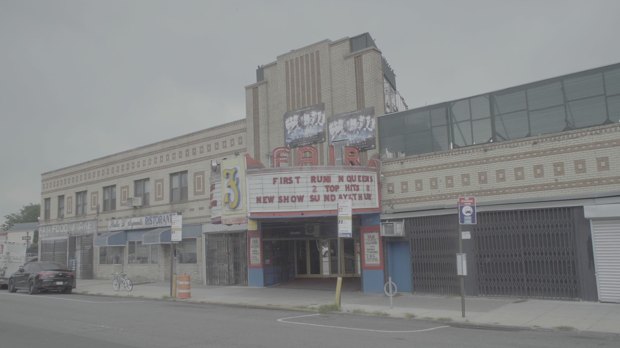 documentary still depicting a rundown movie theater